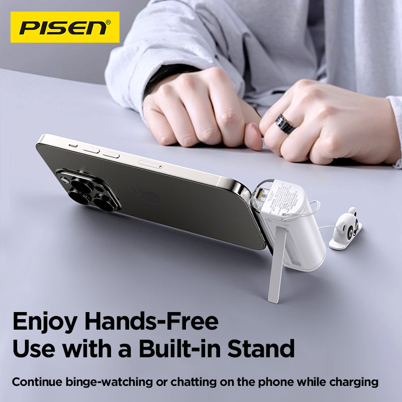 Pisen wireless earbuds charging case with built-in stand holding a smartphone hands-free on a table